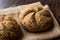 Freshly Baked Whole Wheat Grain Kaiser Roll Round Breads with Sack.