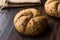 Freshly Baked Whole Wheat Grain Kaiser Roll Round Breads with Sack.