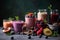 Freshly blended fruit smoothies of various colors and tastes in glass with raspberries, blueberries, strawberries, peach and mint