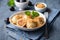 Freshly boiled plum dumplings topped with sweet toasted breadcrumbs