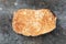 Freshly bread on gray kitchen table.