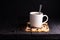 Freshly brewed coffee. Coffee cup or mug arranged on a black wooden table with roasted coffee beans. Espresso mocha cappuccino