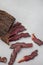 freshly carved traditional South African biltong a type of beef jerky