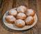 Freshly cooked Apricot jam doughnuts, referred to as jelly doughnuts, donuts in the US