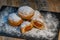 Freshly cooked Apricot jam doughnuts, referred to as jelly doughnuts, donuts in the US