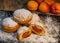 Freshly cooked Apricot jam doughnuts, referred to as jelly doughnuts, donuts in the US