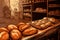 Freshly cooked bread products in bakery. Popular type of small business. Loaves of bread waiting for buyers