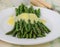 Freshly cooked green asparagus with hollandaise sauce