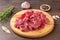 Freshly cut beef or lamb meat - goulash on a wooden cutting board.