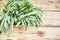 Freshly cut green sage leaves in a wire basket