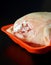 Freshly dumped frozen chicken tenderloin, frozen chicken breast
