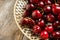 Freshly harvested cherries on vintage metal plate