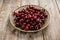 Freshly harvested cherries on vintage metal plate