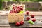 Freshly harvested tastysweet cherries in wooden punnet