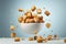 Freshly made crispy croutons fall in pile on blue background. Creative concept of floating healthy snacks