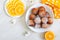 Freshly made donuts with powdered sugar in a white bowl. Curd balls fries. Dessert from the cottage cheese