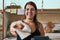 Freshly made just for you. a young woman working in her bakery.