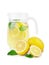 Freshly and multi-colored drinks with ripe, juicy and fresh lemons, bright green mint, water, isolated on a white background.