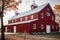 freshly painted exterior of restored barn