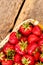 Freshly picked strawberry in basket.