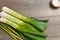 Freshly picked vegetables with wood bowls of sea salt and fresh pepper corns