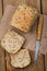 Freshly prepared bread, cut into slices with seeds of flax