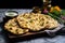 freshly prepared vegan butter naan on a marble board