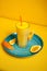 Freshly squeezed orange juice with drinking straws and orange slice