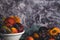 Freshly washed fruits with water droplets. bright high key look conveys freshness. Variety of fresh grapes, apricot and plumes on