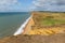 Freshwater beach Dorset with waves and golf course