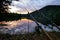 Freshwater fishing with rods on Vltava at sunset