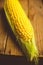 Freshy harvested corn in the wooden crate