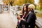 Frican american and caucasian woman posing outside