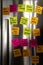 Fridge Door Full of Reminder Notes with Schedule Time to Relax Memo Highlighted