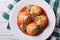 Fried arancini rice balls with tomato sauce closeup. horizontal