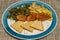 Fried bammy, friend plantain, ackee and sailfish, callaloo