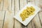 Fried Banana (Pisang Goreng) on wooden background.