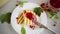 fried bread croutons for breakfast with redcurrant jam in a plate with berries