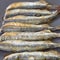 Fried capelin on the table