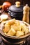 Fried cassava, typical dish from Minas Gerais served on a rustic table, Brazilian rural food