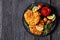 fried chicken cutlets under crusting of panko