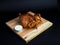 Fried chicken entirely on a wooden stand alone