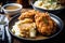 fried chicken and gravy over mashed potatoes, with cornbread on the side