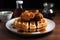 fried chicken and waffles with hot syrup, a classic combo