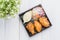 Fried chicken wing and salad on tablecloth on white wood table in kitchen,food menu appetizer