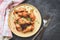 Fried chicken wings crispy salt on wooden plate with fork knife in the dining table - Baked chicken wings barbecue