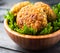 Fried chickpea falafel and leaves of green salad