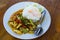 Fried chilly paste with shrimps, squid, fish and fried egg