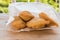 Fried colombian empanadas on wooden table