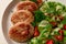 Fried cutlets, turkey, with vegetable salad, top view, no people,